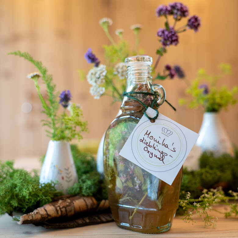 Allgäuer Oxel Eine Flasche mit Allgäuer Oxel steht auf dem Tisch.