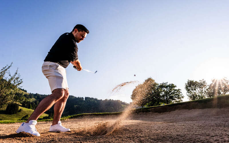 Spiel aus dem Bunker auf dem Golfplatz Steibis